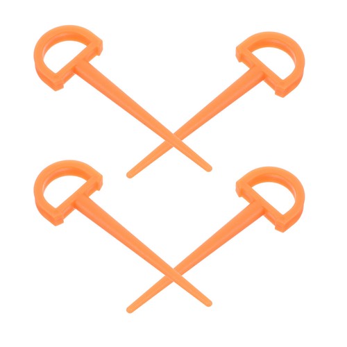 Orange plastic tent pegs - tent, heavy